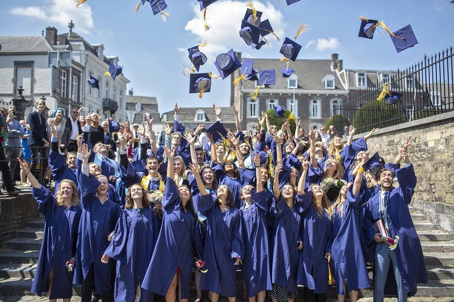 The class of 2018 against a summer sky