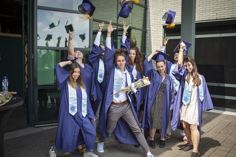 The 2021 cohort's group jump outside the faculty building